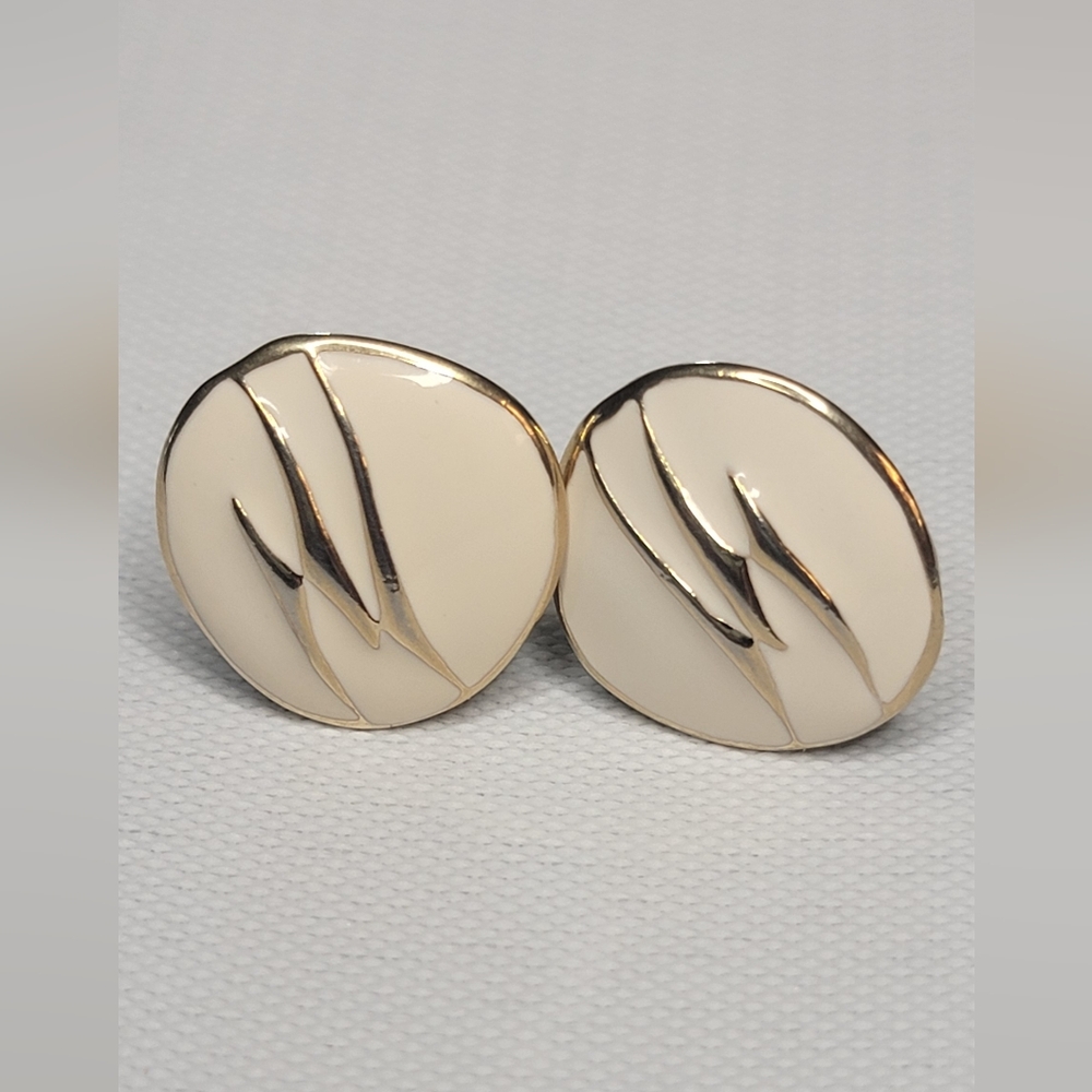 Vintage Trifari White/Cream Enamel with Gold Tone accent clip on earrings